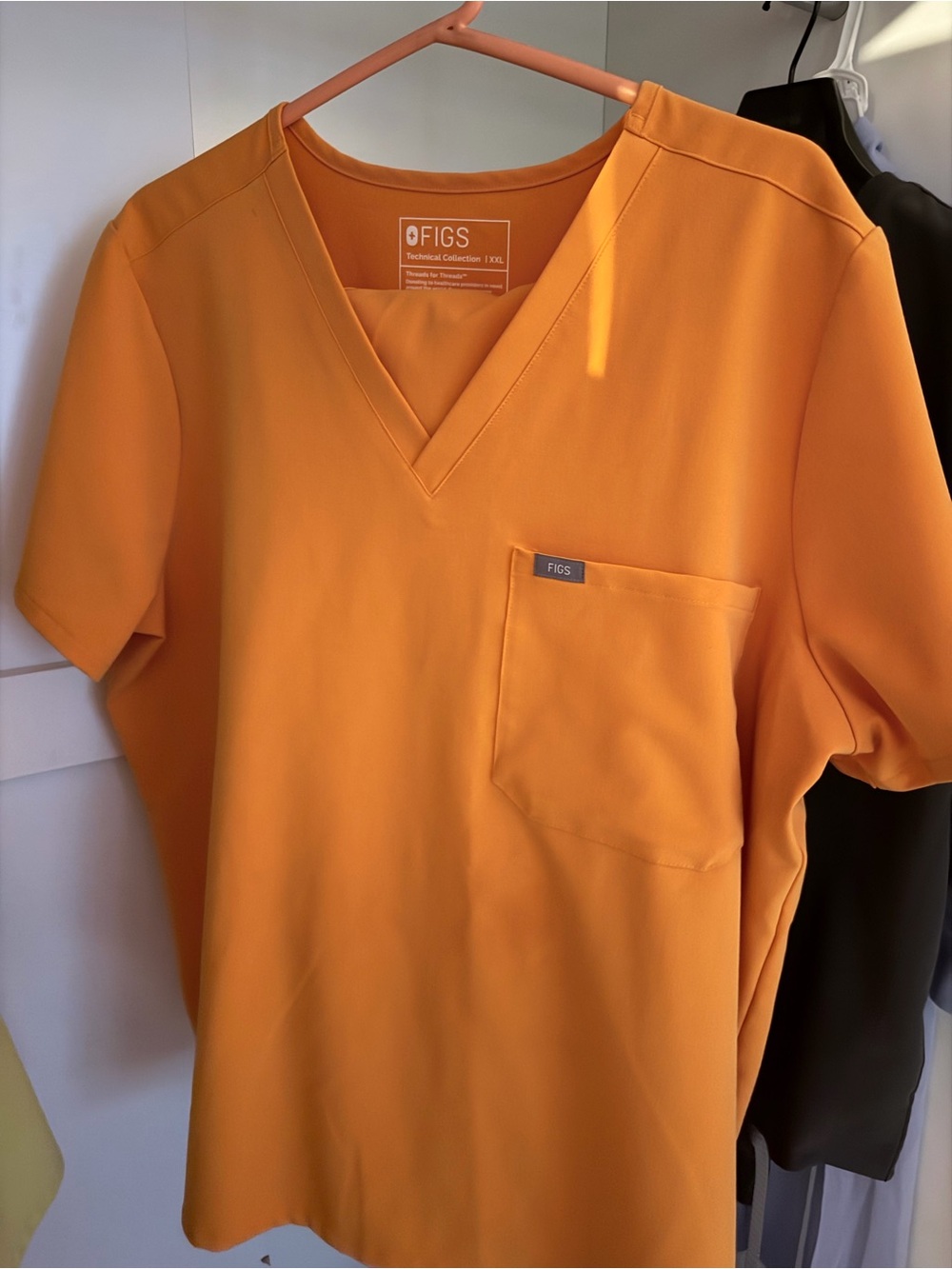FIGS Woman Catarina Scrub Top/ yola skinny scrub pants . (Creamsicle)